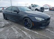 WBS6E9C51GG437118 2016 BMW